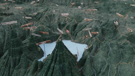 lake atitlan surrounded by tall mountains, as seen on 3d relief map