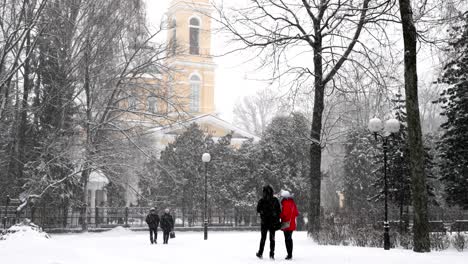 gomel, belarus. bell tower of peter and paul cathedral in winter snowy snowstorm day