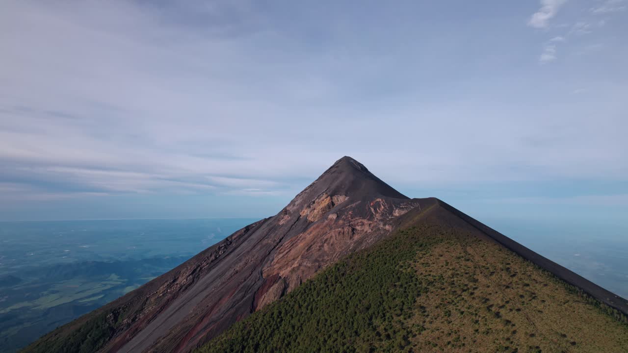 A spectacular drone shot captures Guatemala's Volcán de Fuego at sunrise