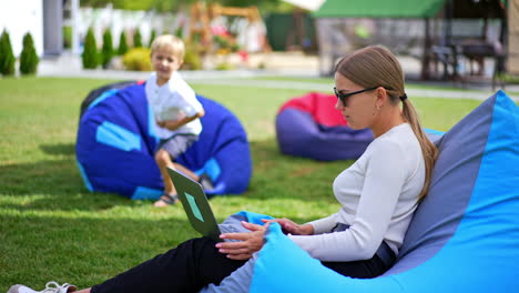 mother and son working outdoors
