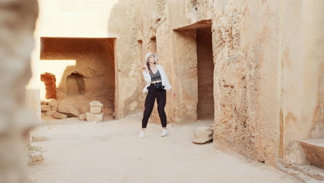 woman photographer exploring ancient ruins