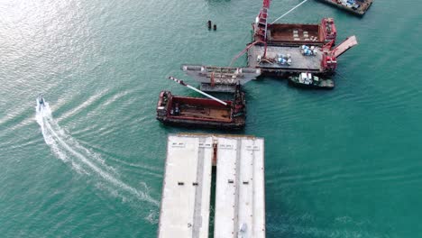 Hong-Kong-cross-bay-link-construction-project,-a-dual-two-lane-bridge-connecting-Tseung-Kwan-O-Lam-Tin-Tunnel-to-Wan-Po-Road,-Aerial-view