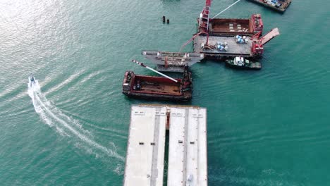 proyecto de construcción del enlace cruzado de la bahía de hong kong, un puente doble de dos carriles que conecta el túnel tseung kwan o lam tin con la carretera wan po, vista aérea