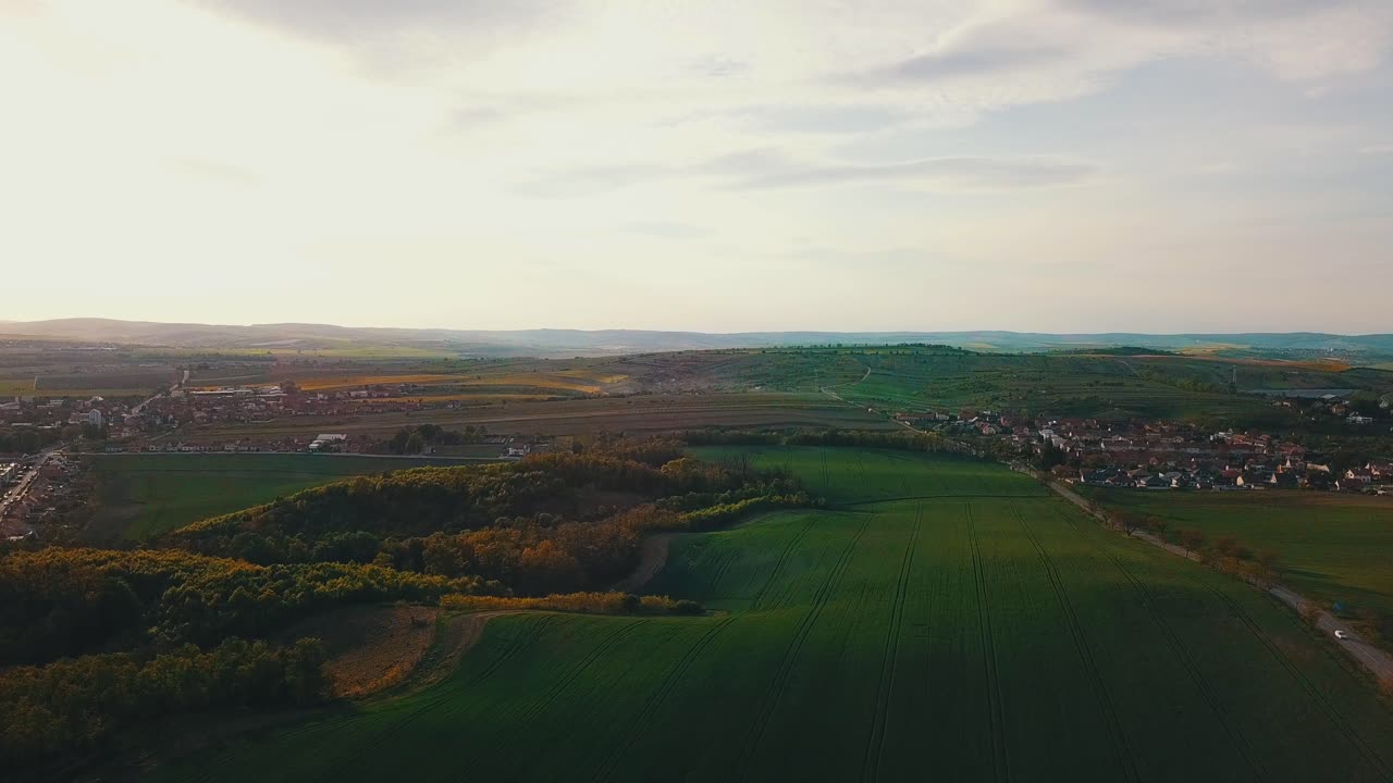Aerial View of a Serene Rural Landscape at Sunset