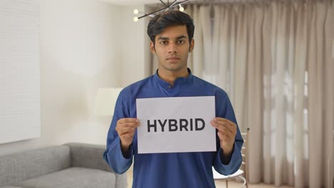 indian boy holding hybrid banner