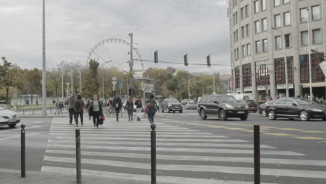 people crossing bajcsy zsilinszky road at a crosswalk in budapest.