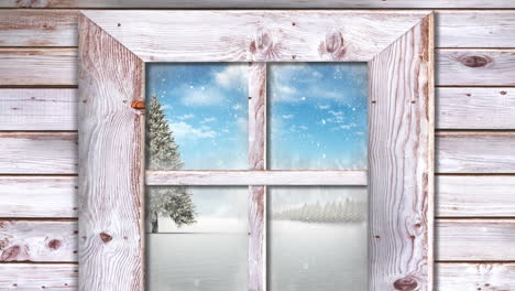 holzfensterrahmen gegen schnee, der über den weihnachtsbaum in der winterlandschaft fällt