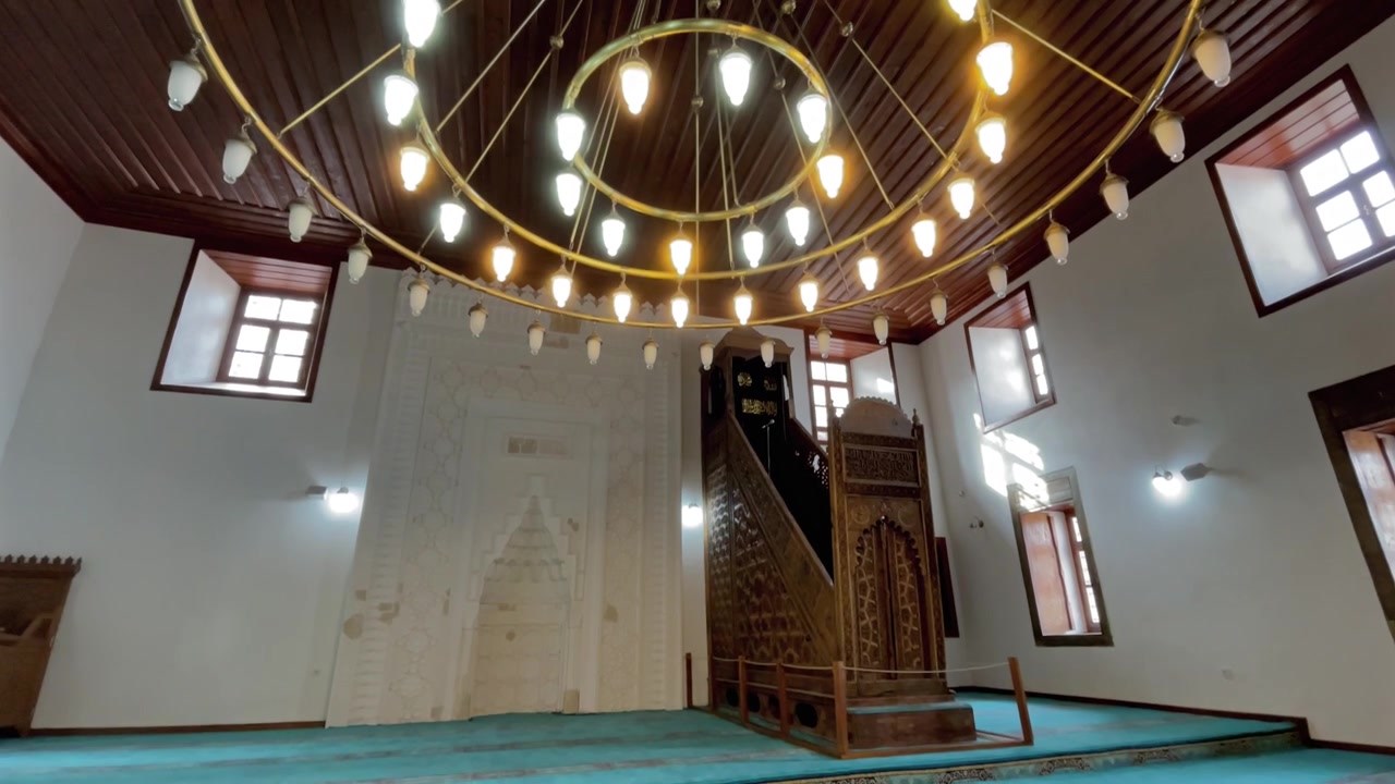 Turkey,Ankara Castle,Sultan Alaaddin Mosque's interior,beautiful chandelier is hanging from the wooden ceiling,inside there is a wooden mimbar made and an alter made from marble,both piece of art.