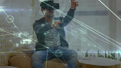 animación de la red de conexiones y estadísticas sobre el hombre de negocios que usa auriculares vr