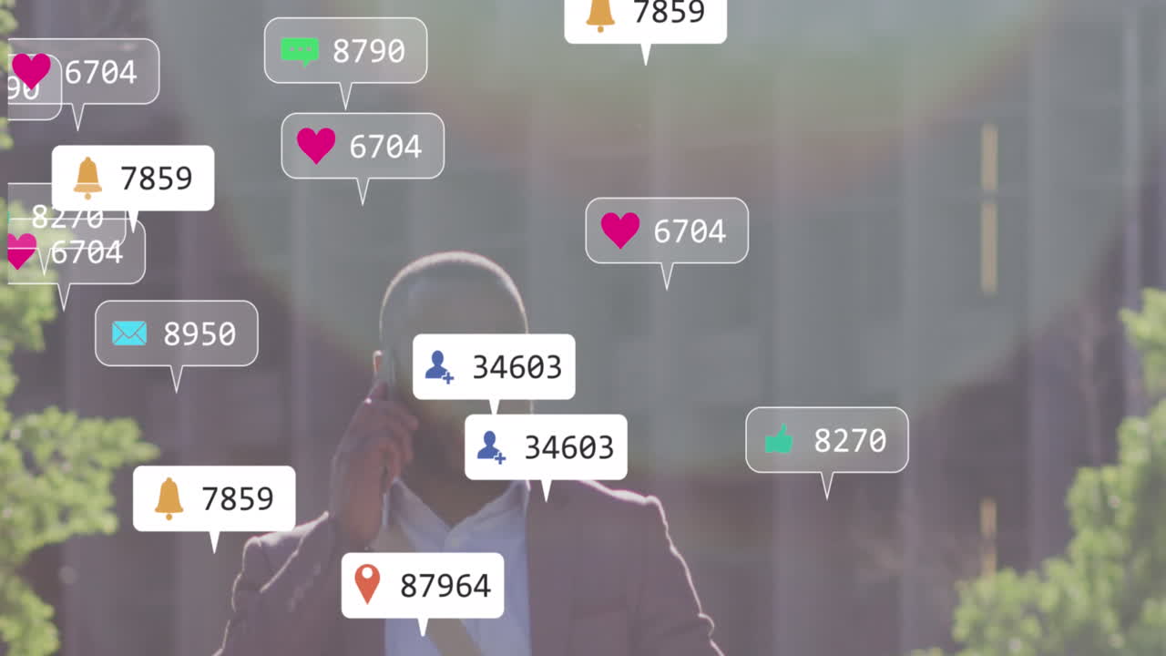 Animation of social media icons against african american man talking on smartphone outdoors