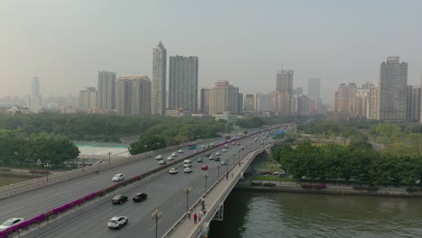 sunny evening guangzhou city pearl river traffic bridge aerial panorama 4k china