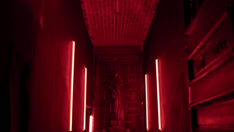 red light and walls in the room