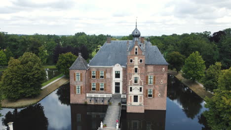 cannenburch castle, the netherlands: aerial view in orbit of the beautiful castle and where you can see the moat that surrounds it