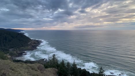 foamy calm waves on the pristine coastline of the oregon coast, united states