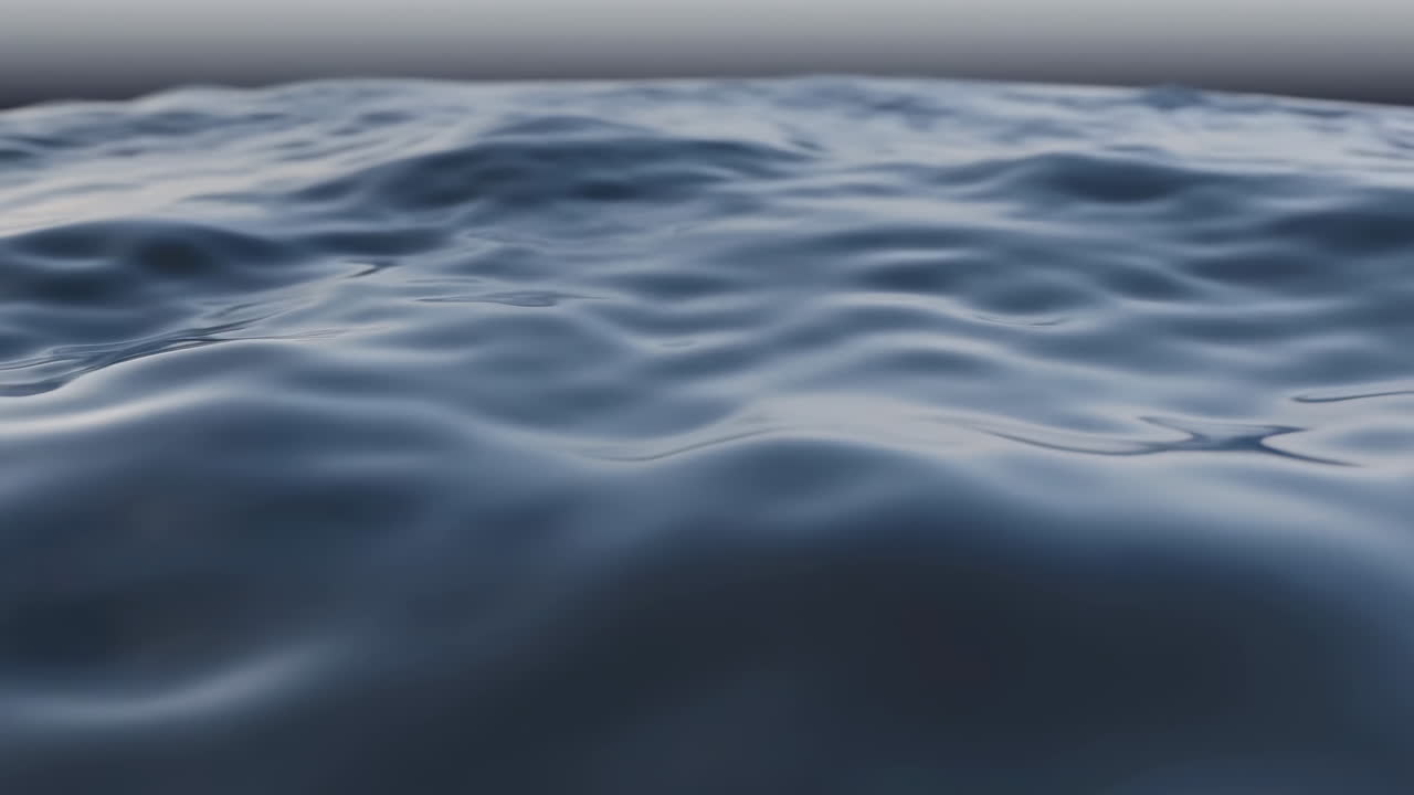 Close-Up of Dark Blue Water Surface with Rippling Waves