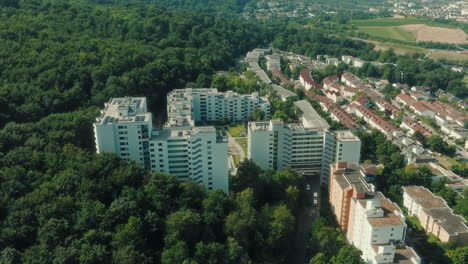 push in drone shot of emmertsgrund neighborhood and cityscape during the day in heidelberg, state of baden-wurttemberg, germany