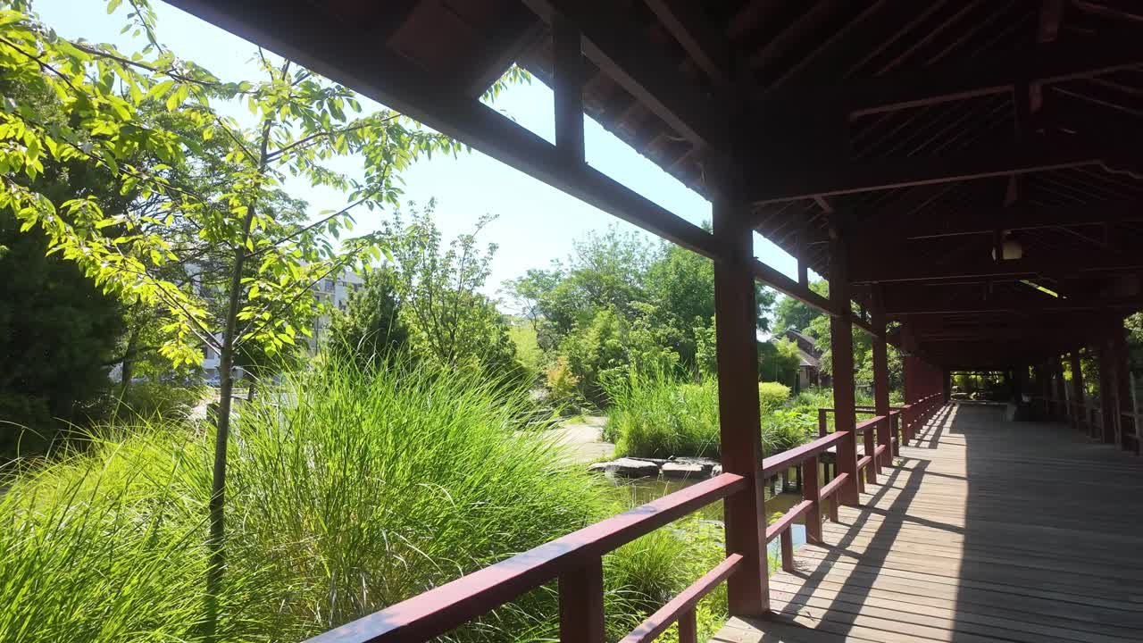 Japanese-Inspired Garden With Wooden Structure On Versailles Island In Nantes, France. Sideways Shot