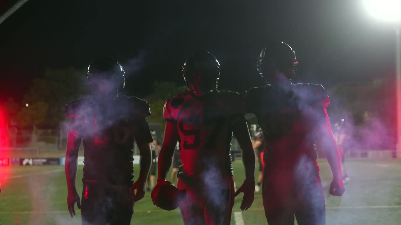 jugadores de fútbol entrando en el campo