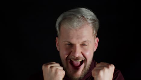 happy man celebrating success