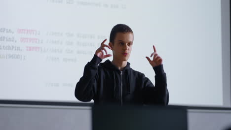 student giving a presentation about programming