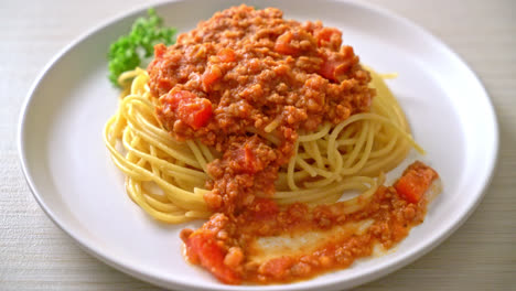 spaghetti bolognese pork or spaghetti with minced pork tomato sauce - italian food style