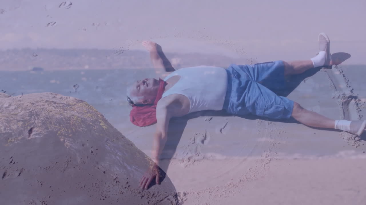 Relaxing on sandy beach, man watching ocean waves and thinking about animation