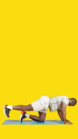 man performing glute kickback exercise with resistance band