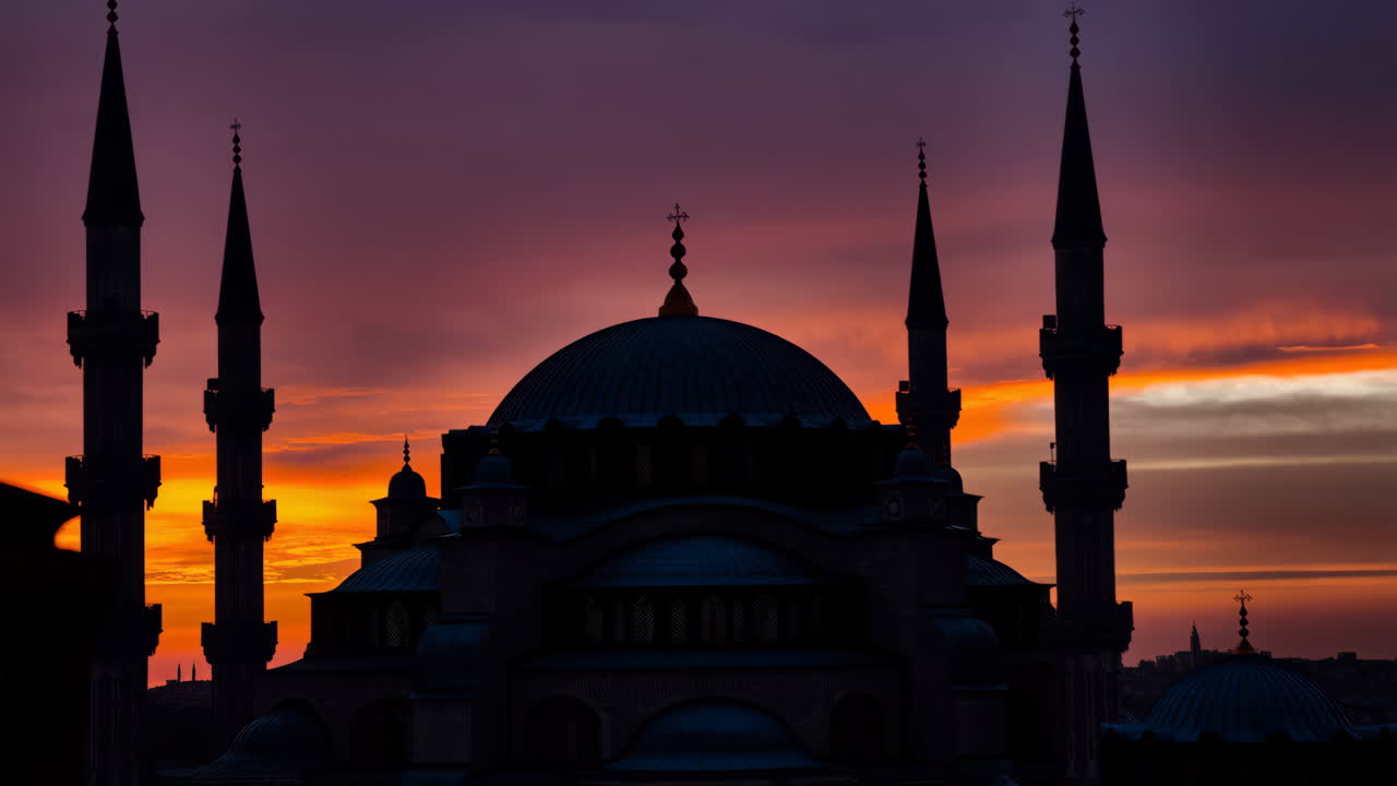 Dramatic Sunset Silhouette of a Mosque with Minarets
