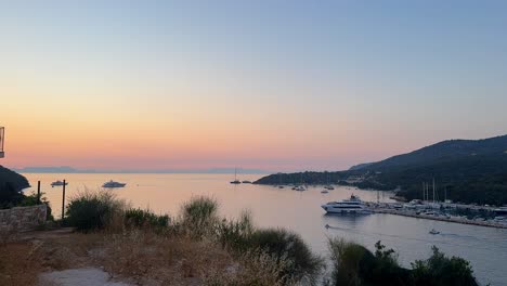 sivota port in the evening with a sunset in the summer, time lapse