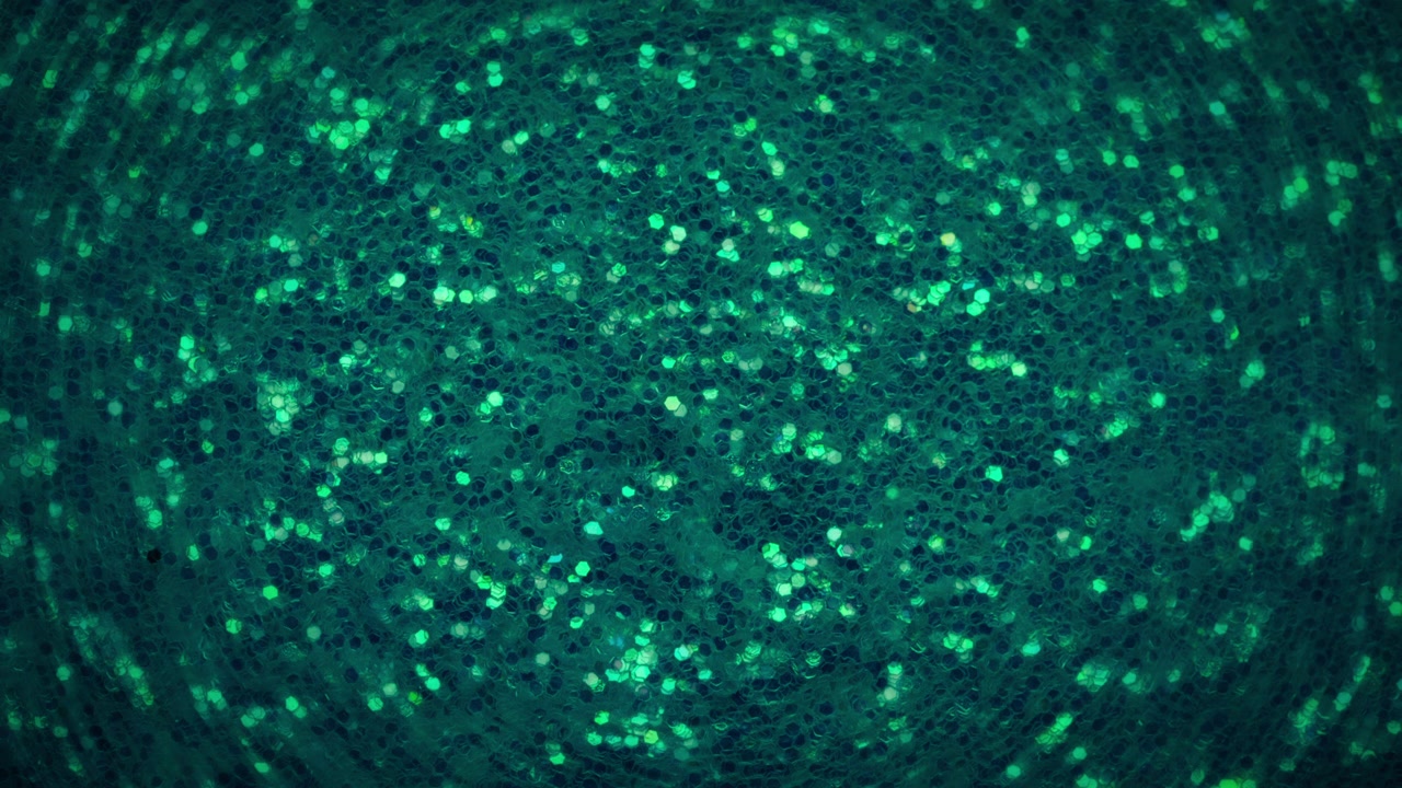 Light green glitter fading out into black