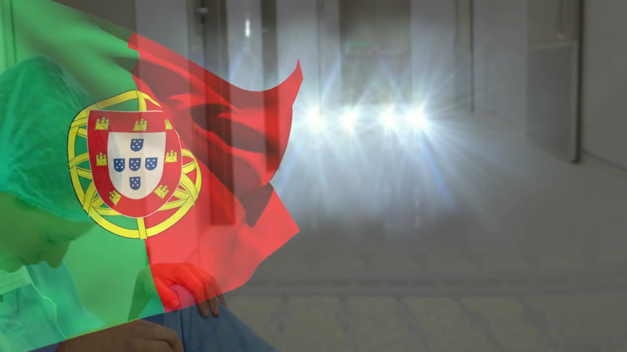 In hospital corridor, person sitting with Portuguese flag animation overlay