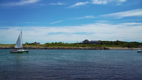 Sailboats-And-Speedboat-Cruising-In-The-Lake-Montauk-At-Daytime-In-Montauk,-New-York,-USA