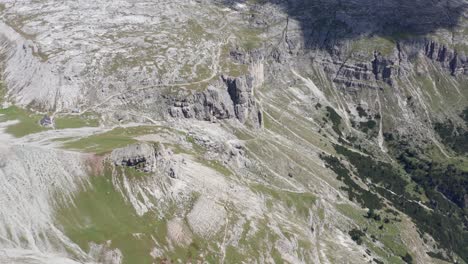 drone shot of the dolomites mountain range in italy that is part of the southern limestone alps