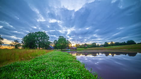 Stunning-timelapse-of-clouds-moving-across-the-sunset-over-the-lake