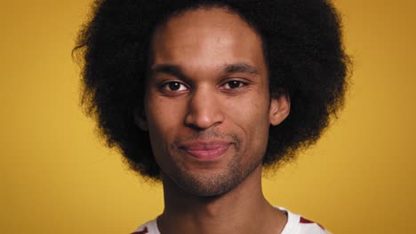 close up portrait of smiling african man in studio shot