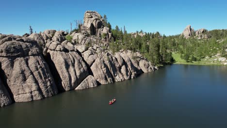 Aerial-View-of-Kayak-in-Sylvan-Lake,-Custer-State-Park,-South-Dakota-USA-on-Sunny-Summer-Day