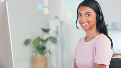 Portrait-of-call-center-agent-with-a-headset-to