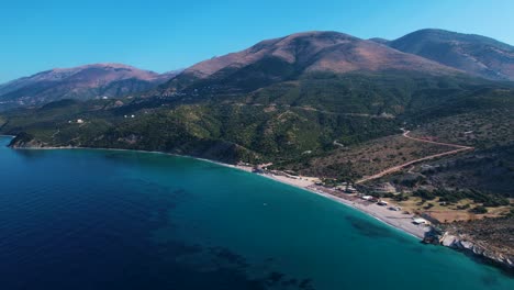 Lukova-Bay-Vast-Seascape-with-Azure-Deep-Sea,-Tranquil-Beach,-and-Green-Olive-Hills-Create-a-Beautiful-Coastal-Haven