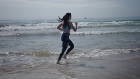woman running on beach