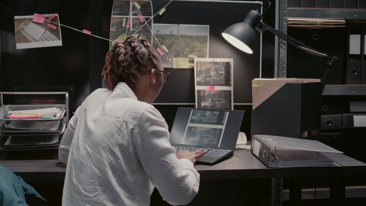 Detective Investigating a Crime Case in the Office