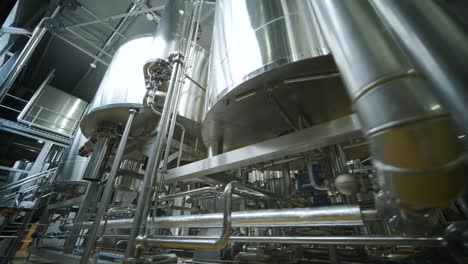 modern craft brewery. craft beer production. modern equipment in brewery, metal tanks, alcoholic drink production