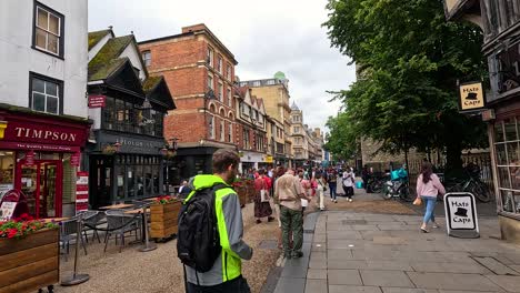 people walking on a bustling street