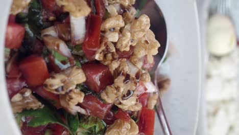 close-up of fresh watermelon and walnut salad