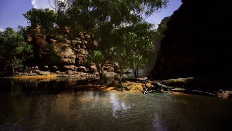 tranquil water body surrounded by rocks and trees in a natural setting