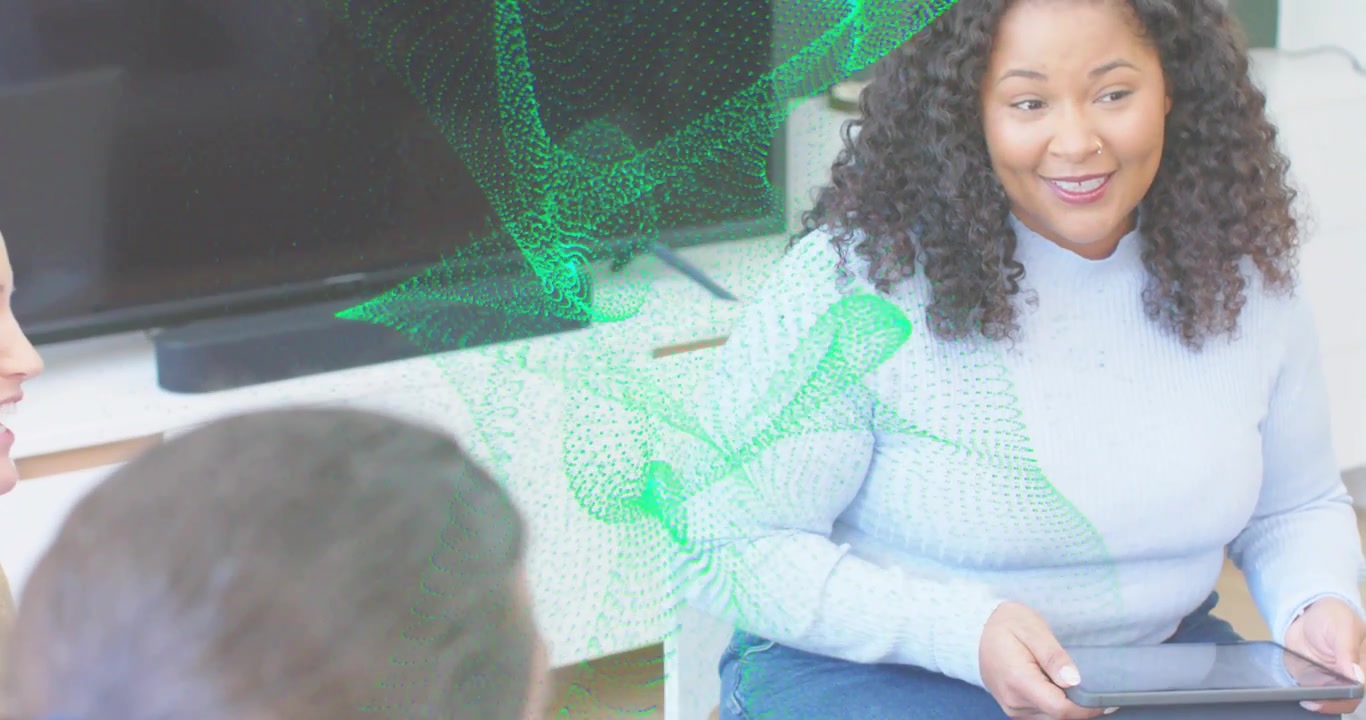 Woman holding tablet shifting posture as green data wave initiating discussion in business meeting