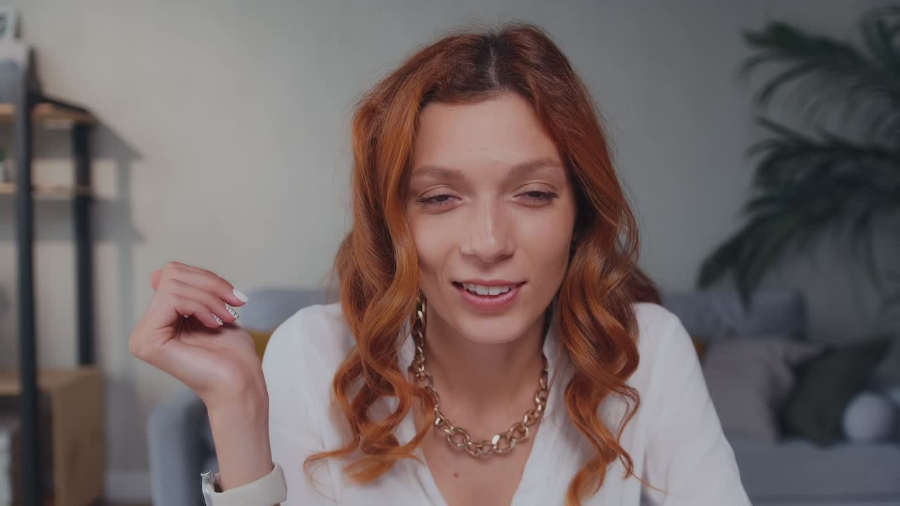 Camera laptop view caucasian business woman smiling talking and gesturing