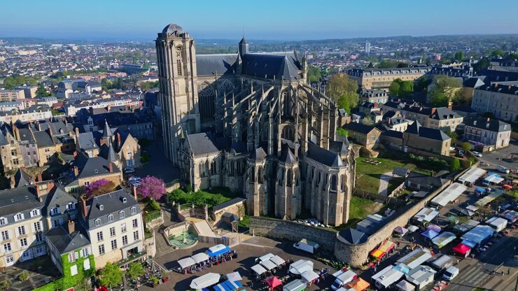 Impressive Le Mans Cathedral, Saint Julien, with Marché des Jacobins, Sarthe in France. Aerial drone forward