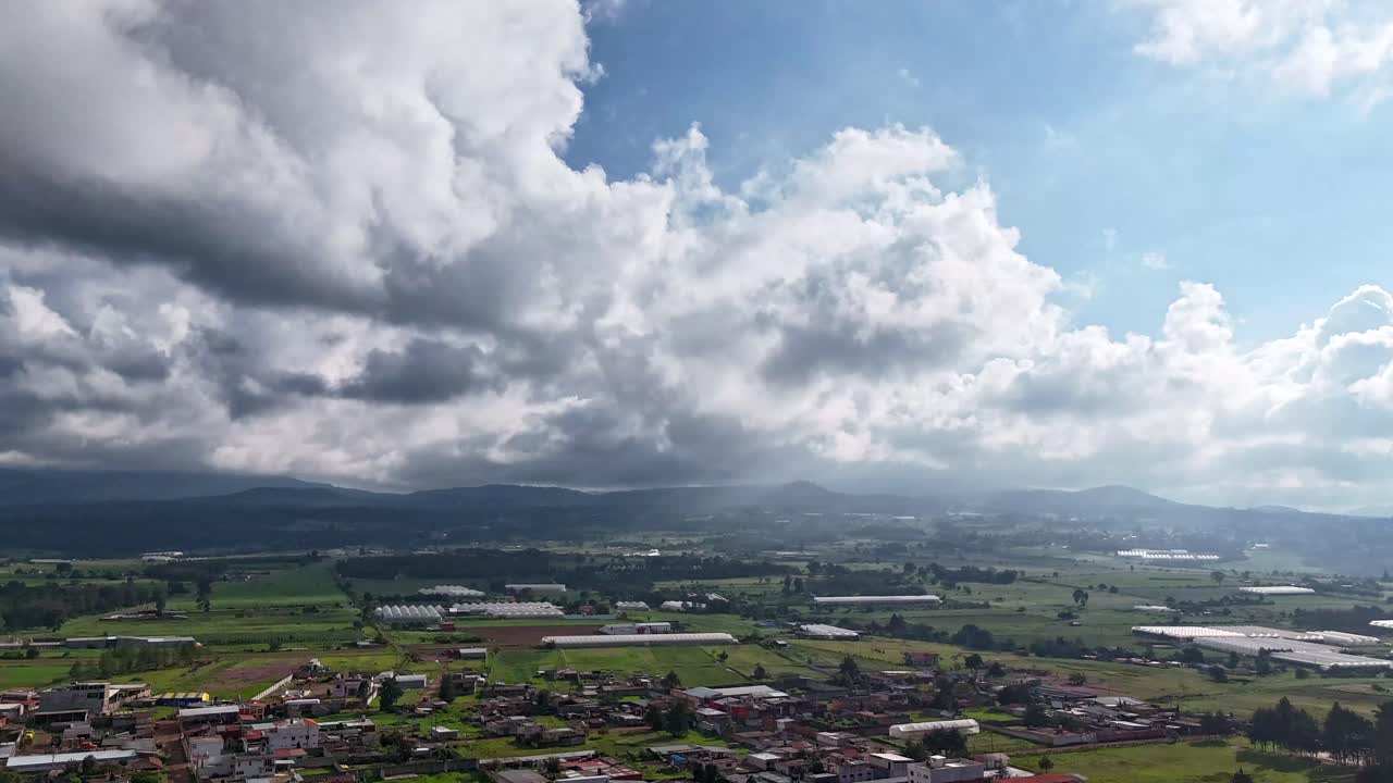 Aerial Orbit Hyperlapse Huge Clouds Over Puebla, Mexico
