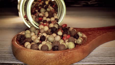 macro close-up mixed peppercorns. dry mix peppercorns close up