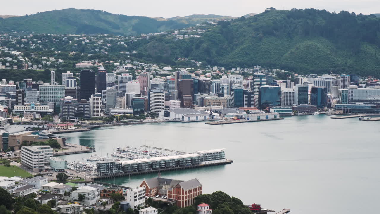 Slow pan of Wellington's waterfront, showcasing its vibrant cityscape and scenic harbor
